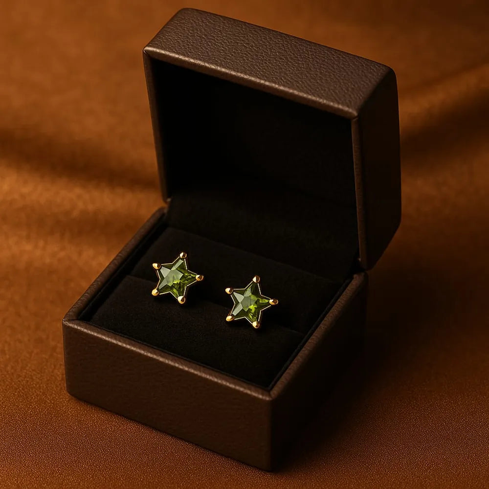 Women’s green star crystal stud earrings with real gold plating, handcrafted on a copper and brass base. These pushback earrings feature a glossy green gemstone in a star shape, offering a modern yet elegant look. Perfect for daily wear, parties, or gifting – from ZHome, Real, Good-Looking Jewellery.