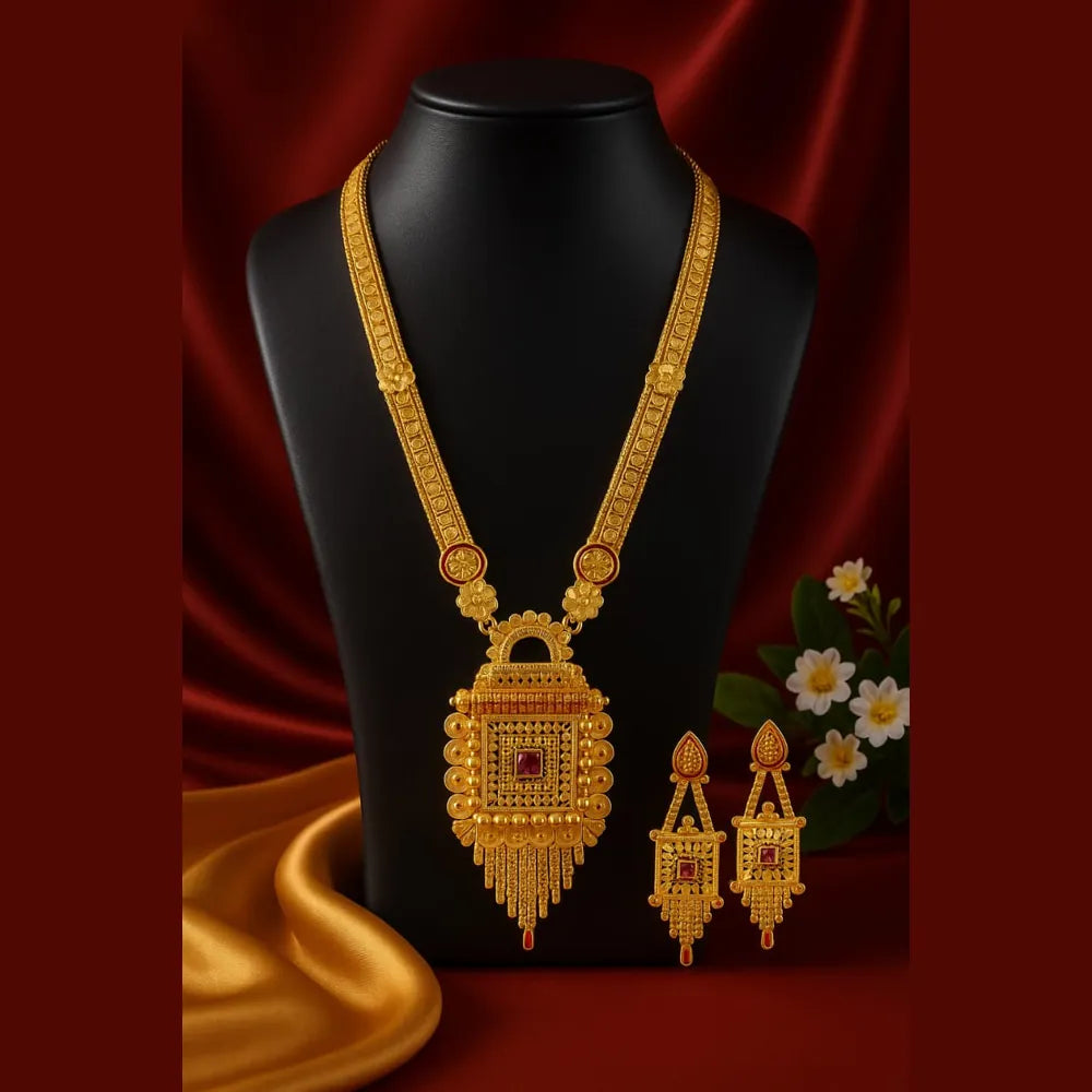 Temple style gold plated Ranihaar necklace with earrings on black mannequin, RealGold look copper base jewellery with ruby stone detailing.