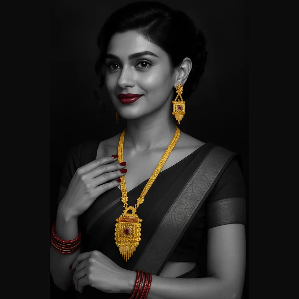 Indian woman wearing RealGold look Ranihaar gold plated necklace and earrings, traditional bridal temple jewellery highlighted in gold on black background.