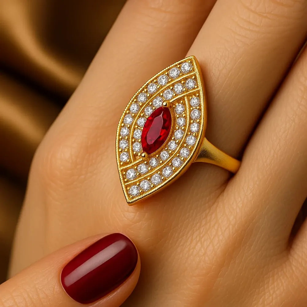 Women’s red stone statement ring with real gold plating, handcrafted on a copper and brass base. Features a bold red zircon stone surrounded by shimmering white crystals for a luxurious look. Adjustable, durable, and elegant – from ZHome, Real, Good-Looking Jewellery.