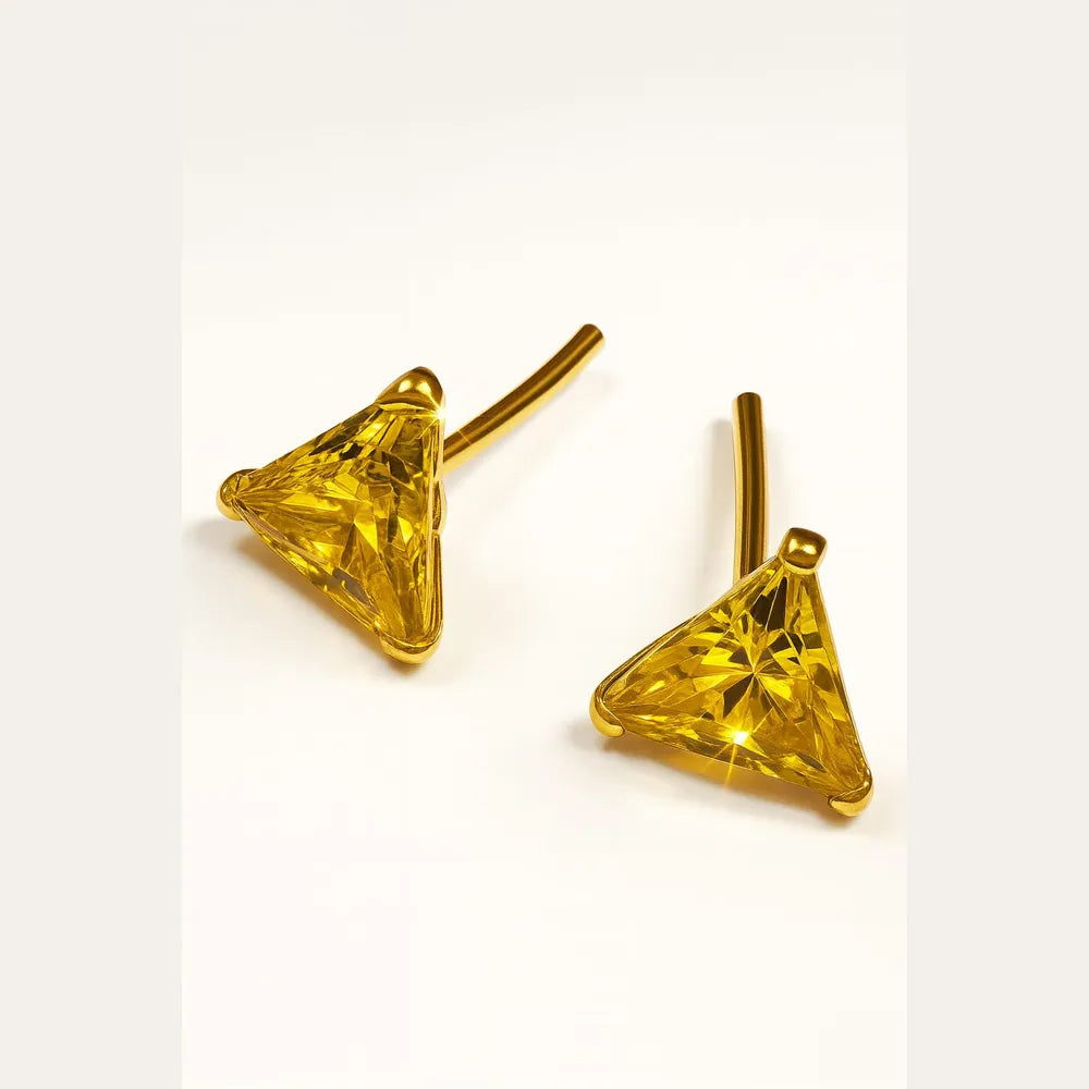 Women’s yellow crystal triangle stud earrings with real gold plating, handcrafted on a copper and brass base. These pushback earrings feature a bright yellow gemstone that gives a rich, elegant glow. Perfect for daily wear, gifting, or special occasions. Lightweight, beautiful, and timeless – from ZHome, Real, Good-Looking Jewellery.