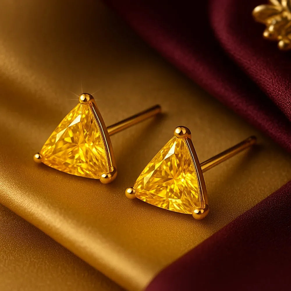Women’s yellow crystal triangle stud earrings with real gold plating, handcrafted on a copper and brass base. These pushback earrings feature a bright yellow gemstone that gives a rich, elegant glow. Perfect for daily wear, gifting, or special occasions. Lightweight, beautiful, and timeless – from ZHome, Real, Good-Looking Jewellery.
