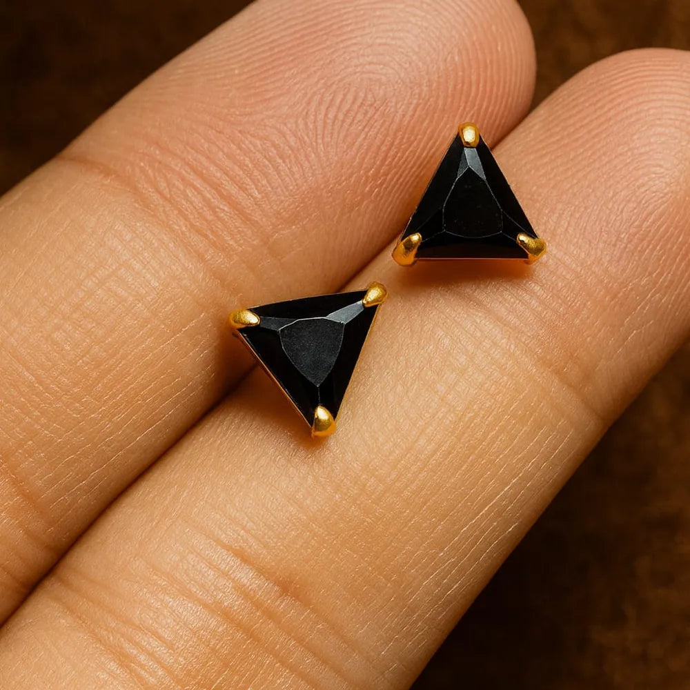 Unisex black crystal triangle ear studs with real gold plating, handcrafted with precision for a premium look. Elegant and lightweight, these daily wear earrings are made from copper and brass base with a pushback design. Ideal for men and women, these gold-plated black studs feature a glossy triangle crystal that adds a bold yet classy touch to any outfit. Perfect for gifting or personal use, from ZHome – Real, Good-Looking Jewellery.