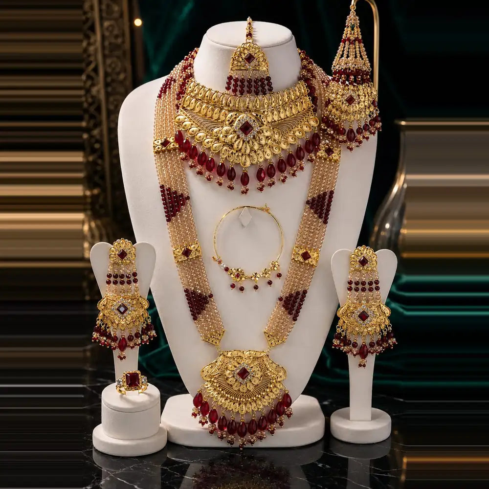 Exclusive Maroon Crystal Beads & Gold Finish Bridal Combo Jewellery Set (Choker + Long Necklace + Earrings + Maangtika + Pasa + Nath)